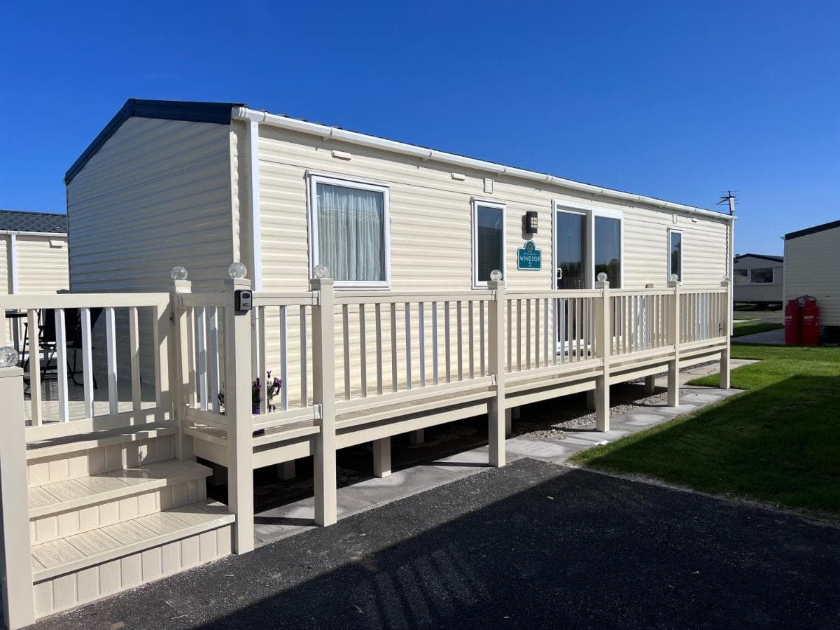 PG174 Golden Palm 8 Berth with Decking: caravan with wraparound decking